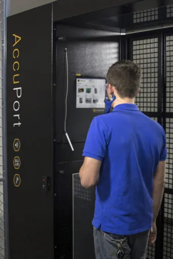 AccuPort man holding wrench